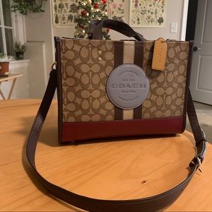 Brand new!! Dempsey carryall coach bag